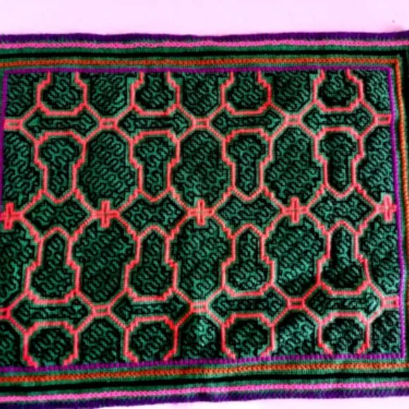 Hand embroidered shipibo altar design multicolored patterns Amazon jungle